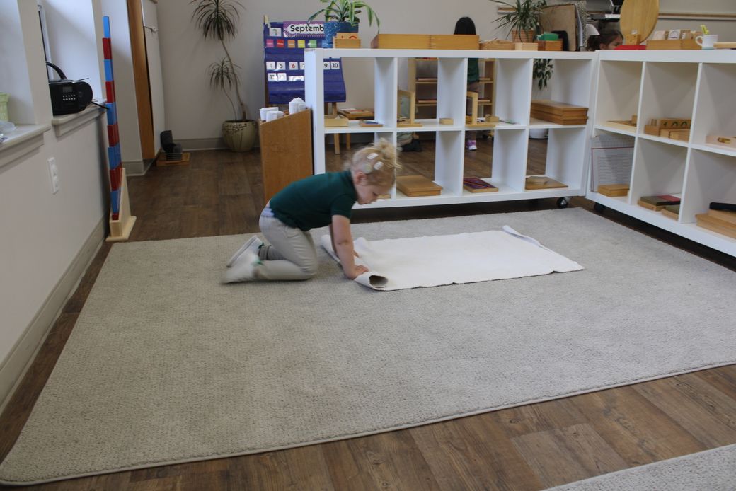 Children exploring Montessori materials at Althorp Montessori School